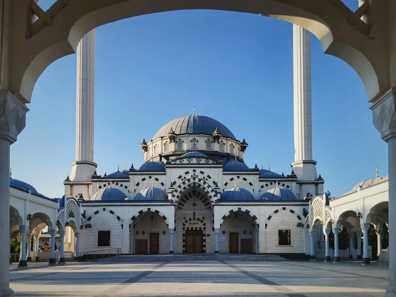 gallery-3 Beautiful architectural shot of a mosque with blue sky backdrop captured in daylight.